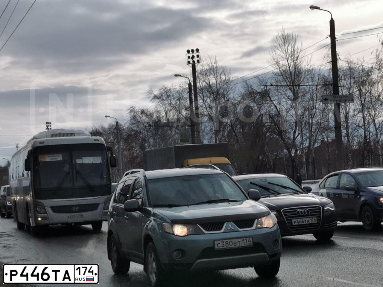 Фото автомобиля AUDI A8, 2012 — госномер Р446ТА174. Цвет: ЧЕРНЫЙ