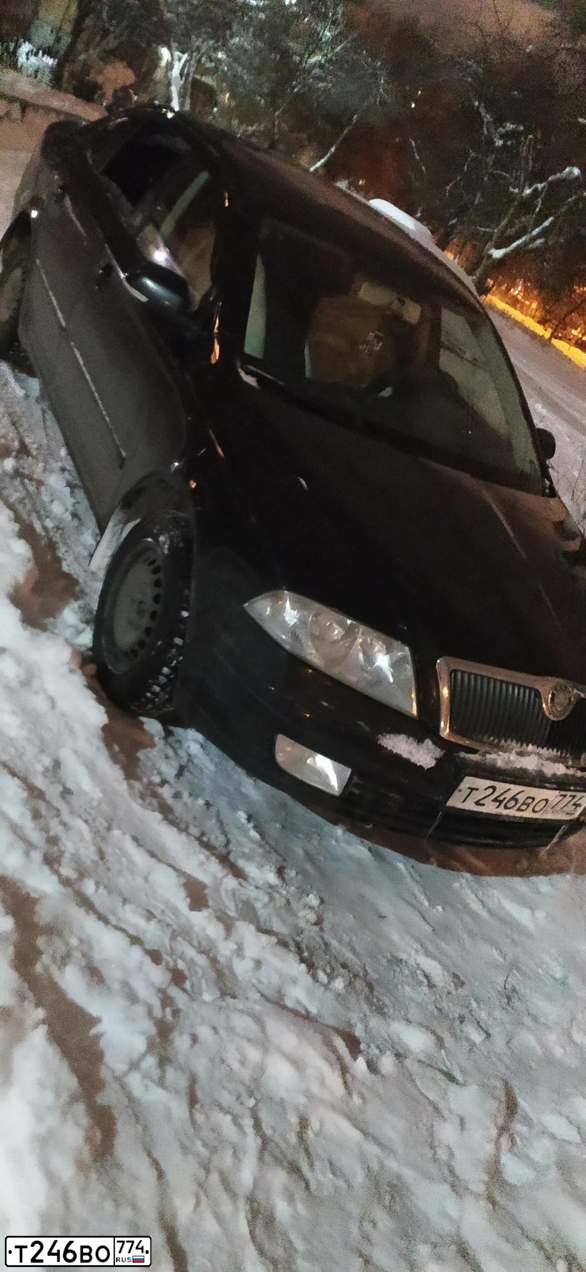 Фото автомобиля SKODA OCTAVIA, 2006 — госномер Т246ВО774. Цвет: ЧЕРНЫЙ