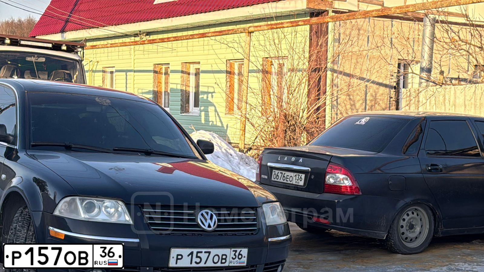 Фото автомобиля VOLKSWAGEN PASSAT, 2002 — госномер Р157ОВ36. Цвет: ЧЕРНЫЙ