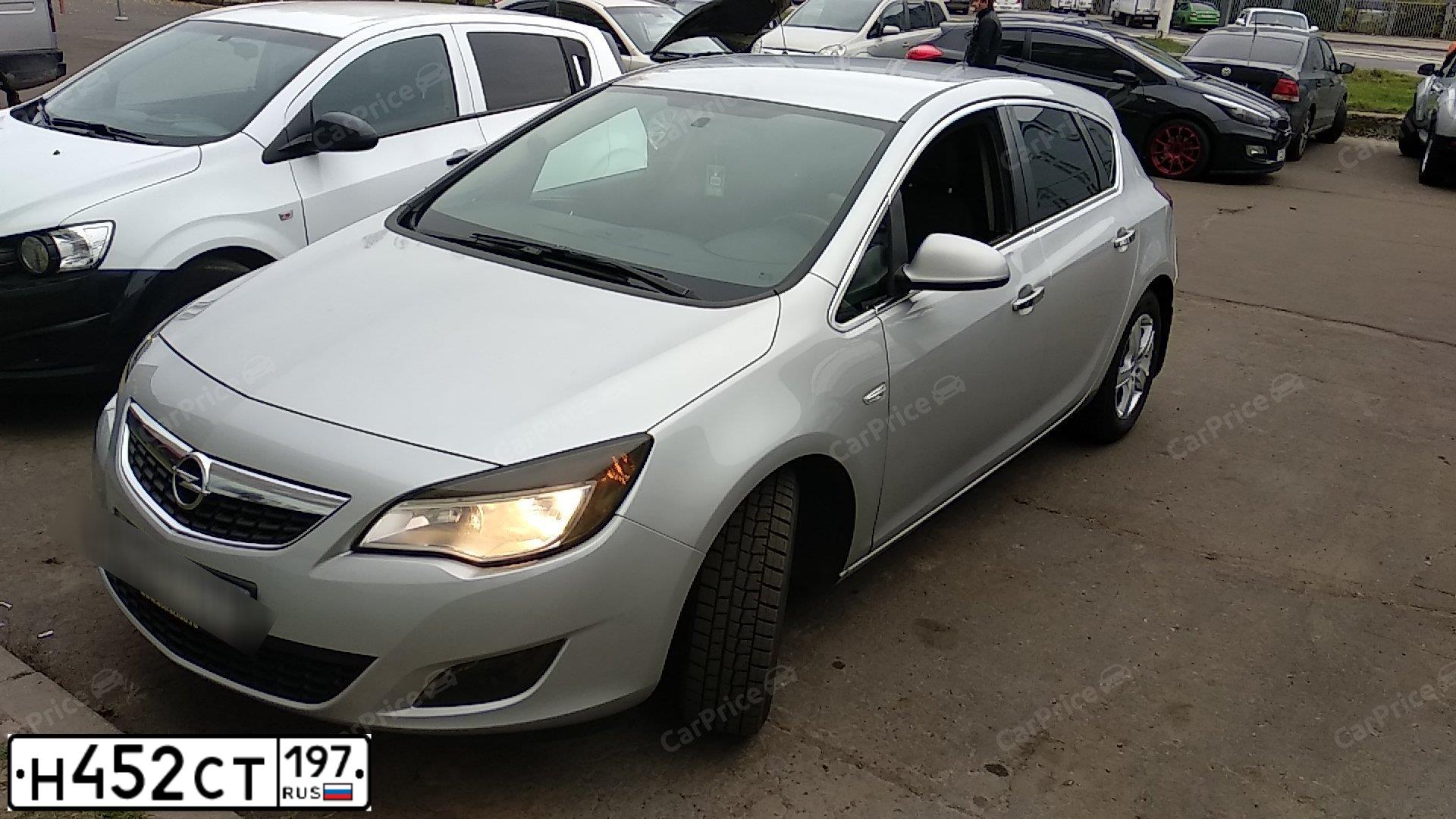 Фото автомобиля OPEL ASTRA, 2011 — госномер Р180АМ761. Цвет: СЕРЕБРИСТЫЙ МЕТАЛЛИК
