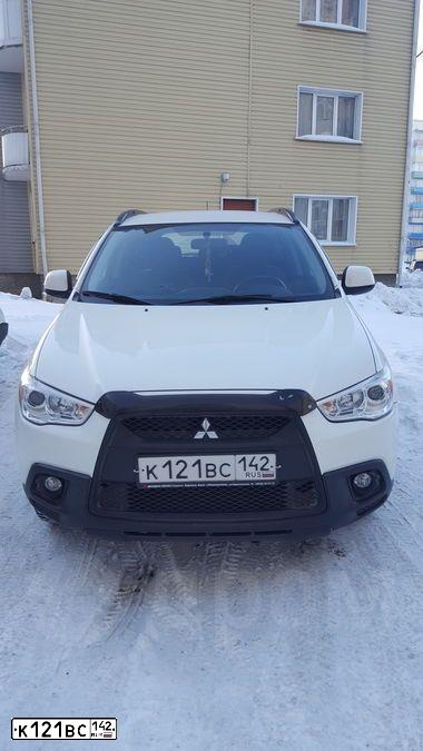 Фото автомобиля MITSUBISHI ASX, 2013 — госномер Е124НК142. Цвет: Белый