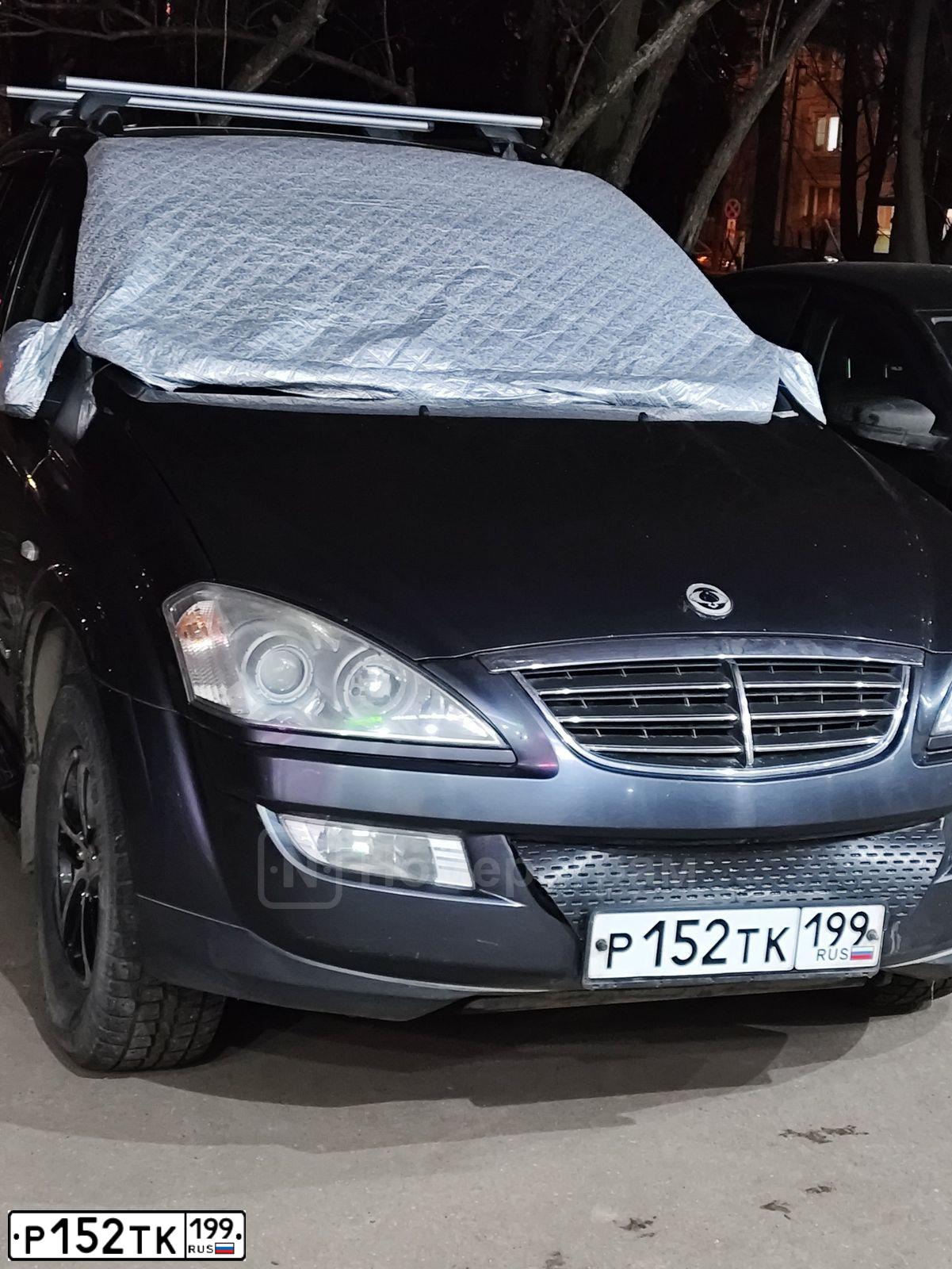 Фото автомобиля SSANGYONG KYRON, 2009 — госномер В892КО550. Цвет: Серо-голубой