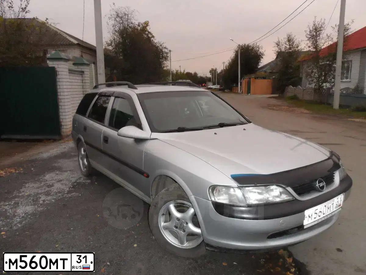 Фото автомобиля OPEL VECTRA, 1998 — госномер Х958РЕ31. Цвет: СЕРЕБРИСТО-БЕЛЫЙ