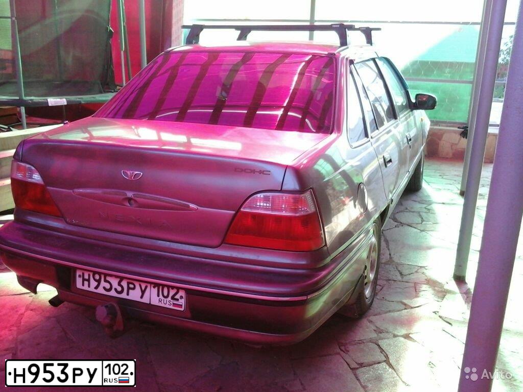 Фото автомобиля DAEWOO NEXIA, 2004 — госномер Н953РУ102. Цвет: СЕРО-БЕЖЕВЫЙ