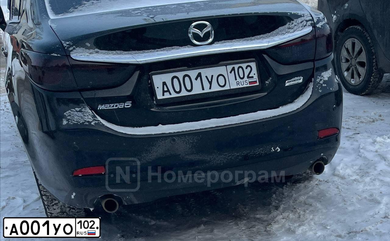 Фото автомобиля SUBARU FORESTER, 2007 — госномер А001УО102. Цвет: Красный