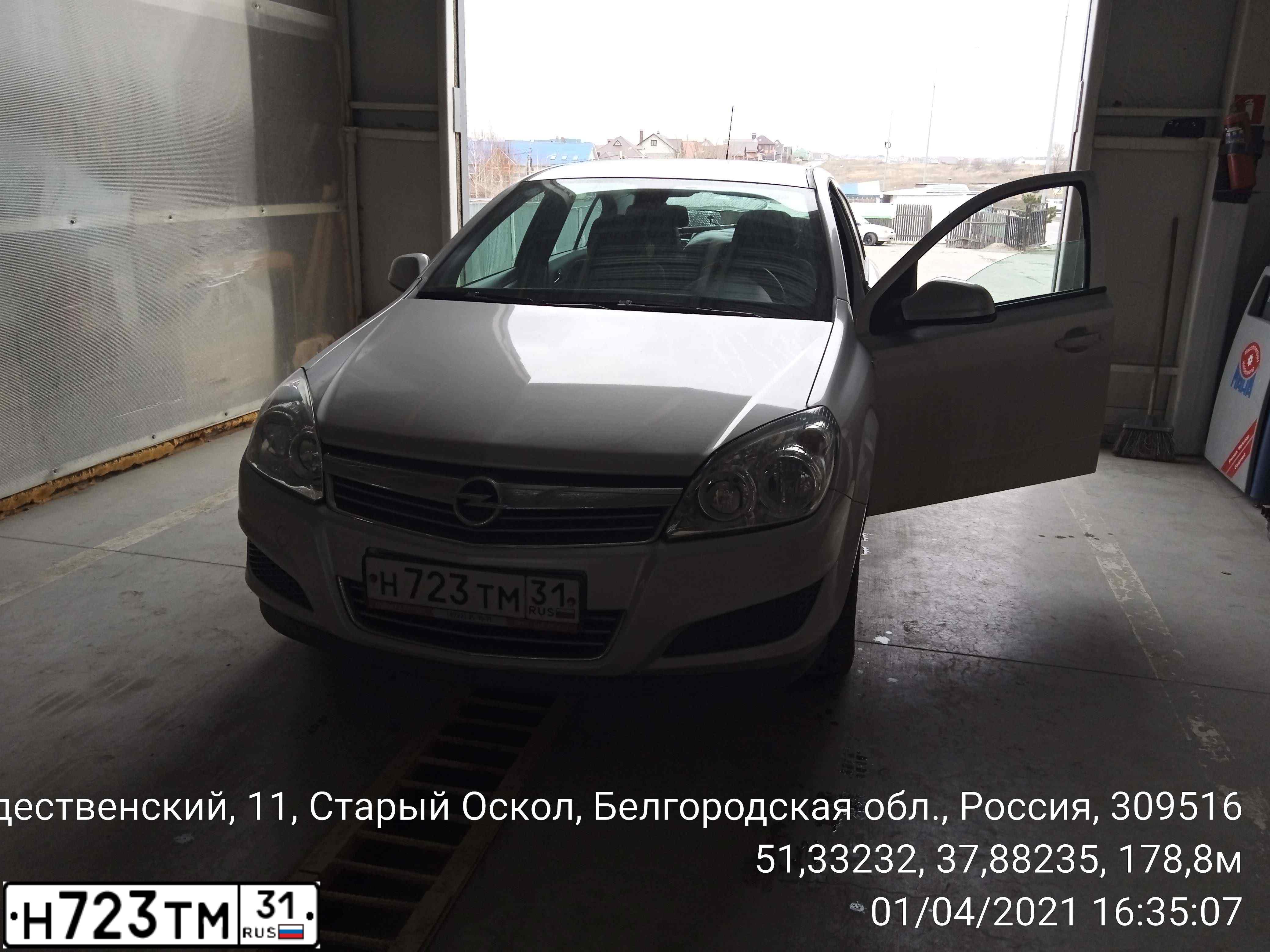Фото автомобиля OPEL ASTRA, 2013 — госномер Х282ТТ31. Цвет: СЕРЕБРИСТЫЙ