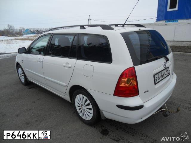 Фото автомобиля TOYOTA COROLLA, 2006 — госномер У062НА72. Цвет: Белый
