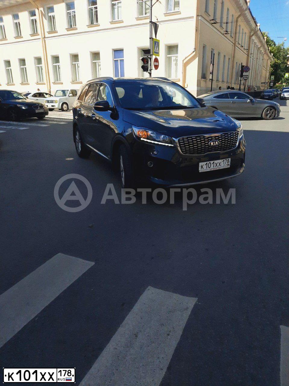 Фото автомобиля KIA SORENTO, 2012 — госномер К101ХХ178. Цвет: ЧЕРНЫЙ