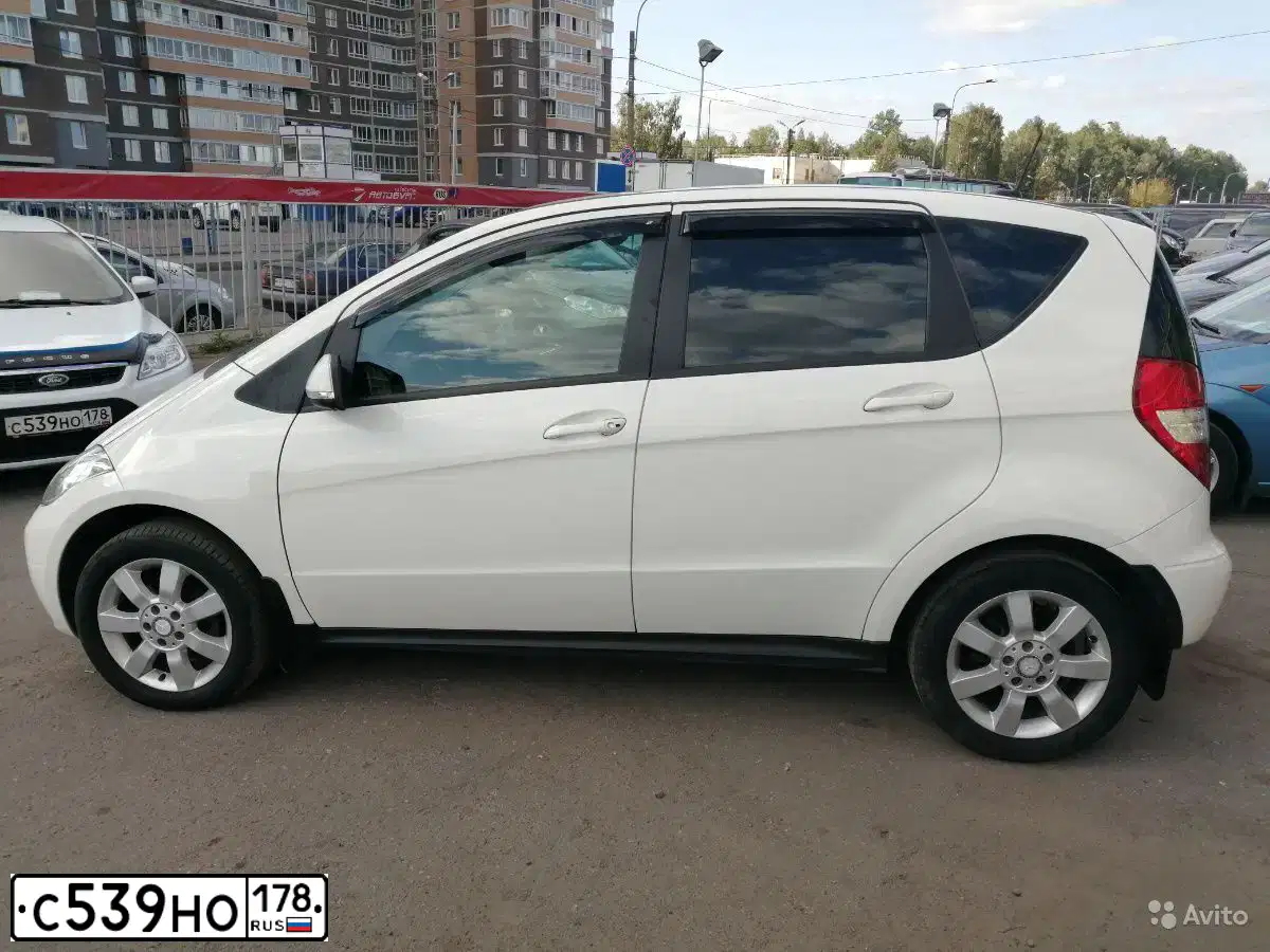 Фото автомобиля FORD FOCUS, 2011 — госномер Н450НН159. Цвет: БЕЛЫЙ