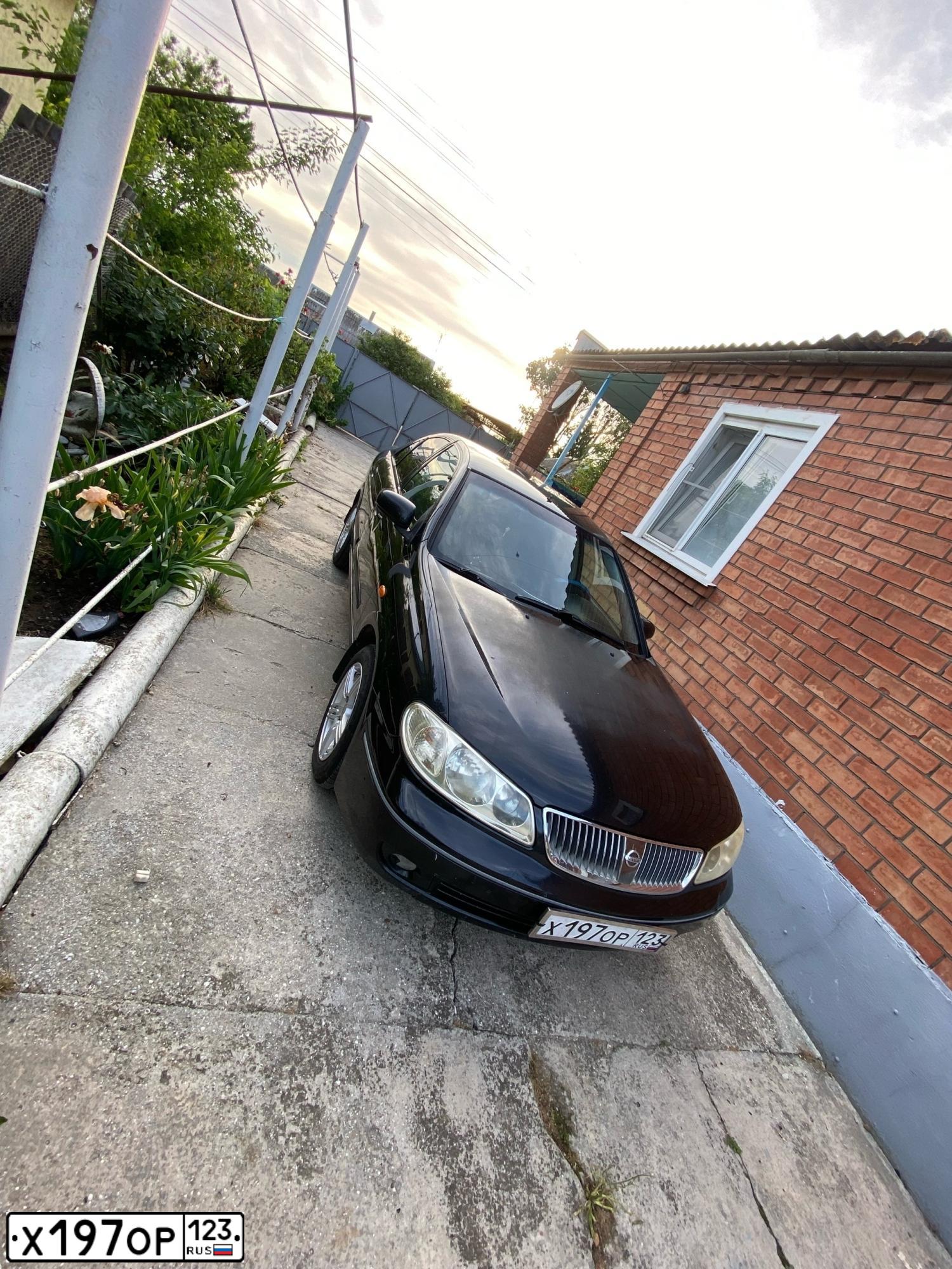 Фото автомобиля NISSAN ALMERA, 2004 — госномер Х197ОР123. Цвет: ЧЕРНЫЙ