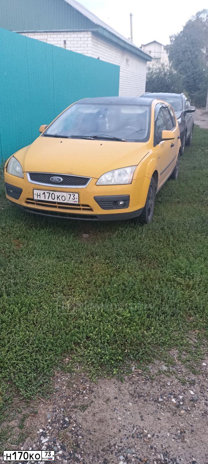Фото автомобиля FORD FOCUS, 2007 — госномер Н170КО73. Цвет: ЖЕЛТЫЙ