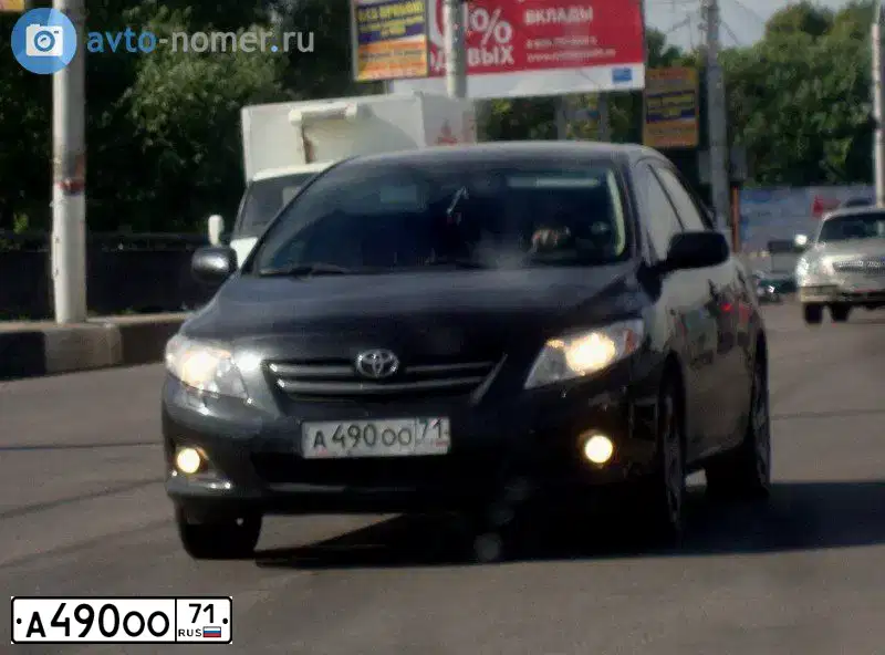 Фото автомобиля TOYOTA COROLLA, 2008 — госномер Е812УР750. Цвет: ЧЕРНЫЙ