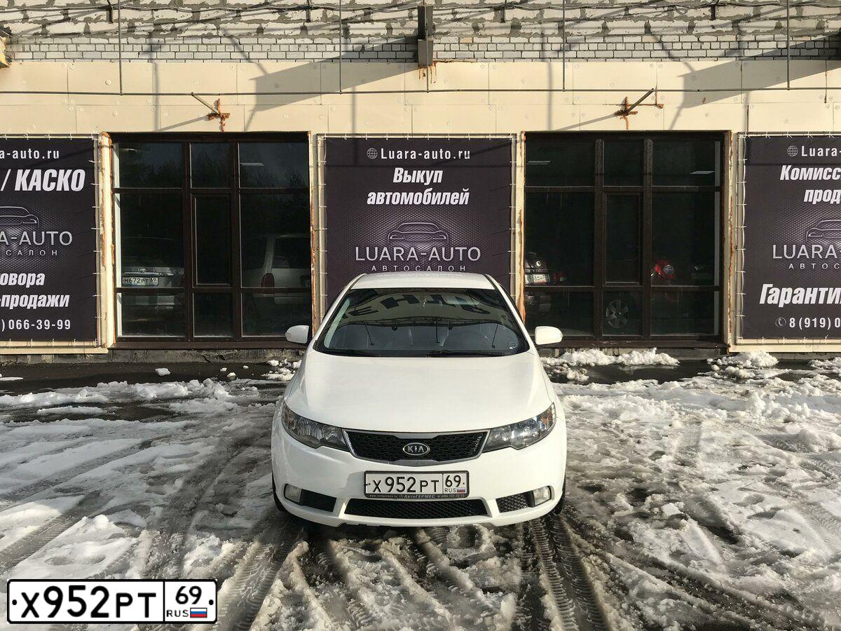 Фото автомобиля KIA CERATO, 2009 — госномер Х952РТ69. Цвет: Белый
