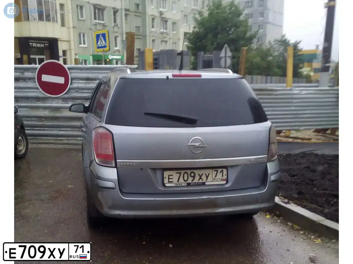 Фото автомобиля OPEL ASTRA, 2007 — госномер Е709ХУ71. Цвет: СЕРЫЙ