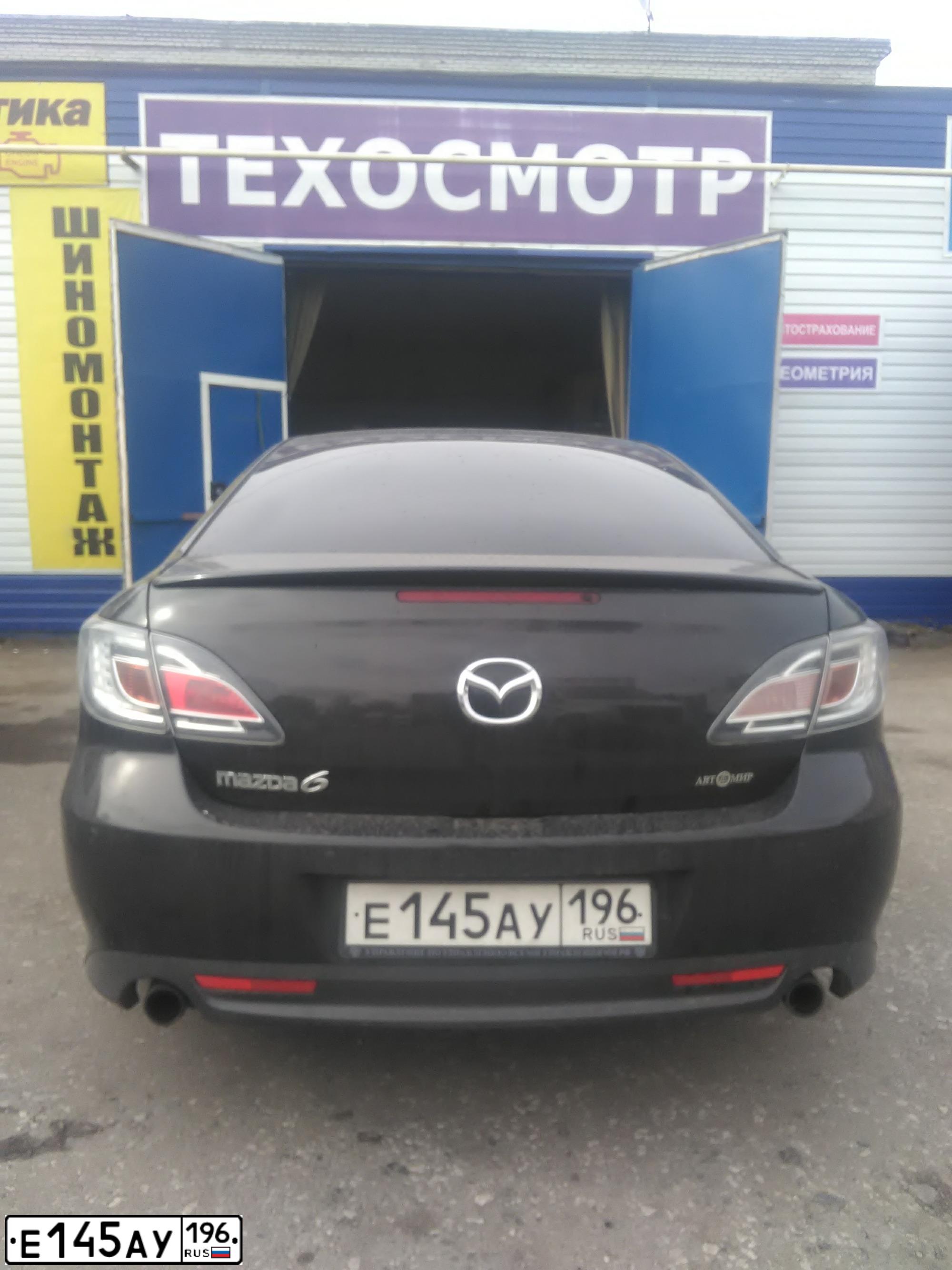 Фото автомобиля DATSUN ON-DO, 2016 — госномер Е145АУ196. Цвет: ЧЕРНЫЙ