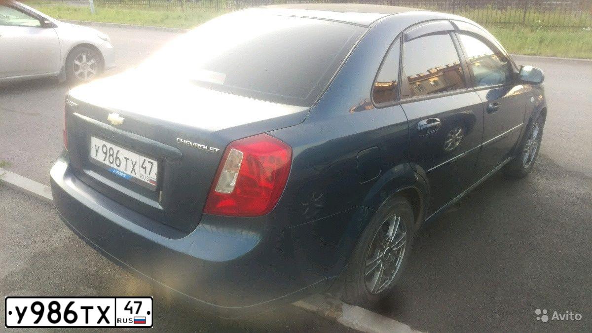 Фото автомобиля CHEVROLET LACETTI, 2007 — госномер У986ТХ47. Цвет: СИНИЙ