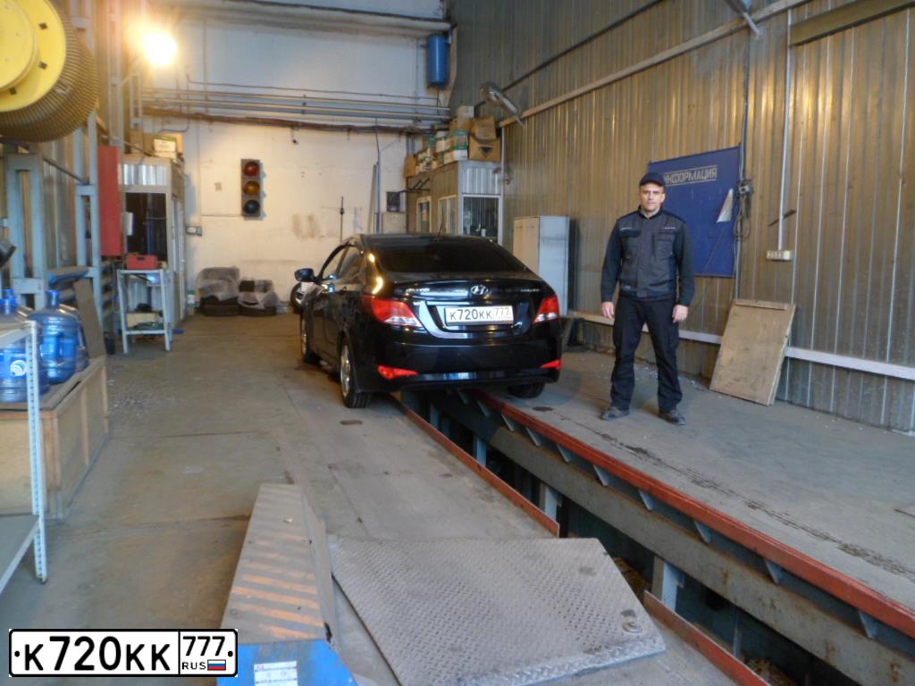 Фото автомобиля HYUNDAI SOLARIS, 2014 — госномер К720КК777. Цвет: ЧЕРНЫЙ