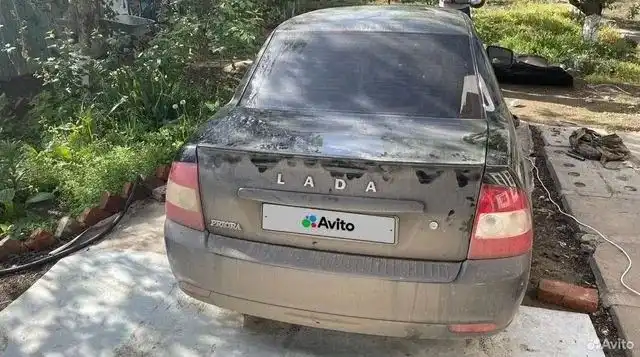 Фото автомобиля LADA 2170 PRIORA, 2011 — госномер С320НТ30. Цвет: Сине-Черный