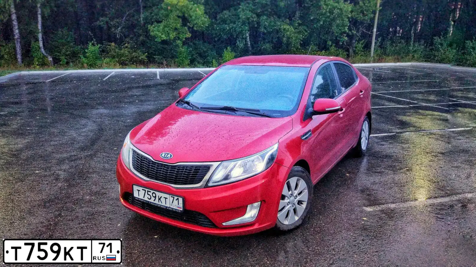 Фото автомобиля KIA RIO, 2011 — госномер Т759КТ71. Цвет: Красный