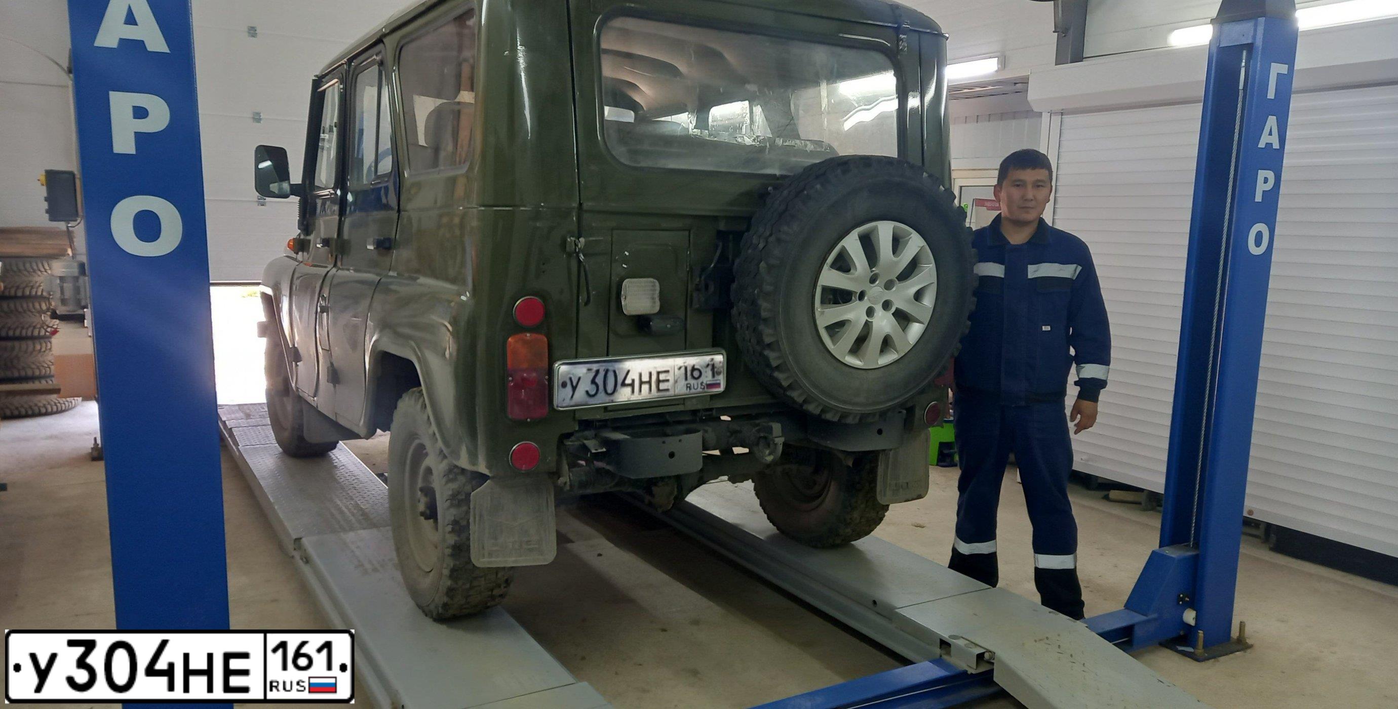 Фото автомобиля UAZ 3151 / HUNTER, 2003 — госномер У304НЕ161. Цвет: ЗАЩИТНЫЙ