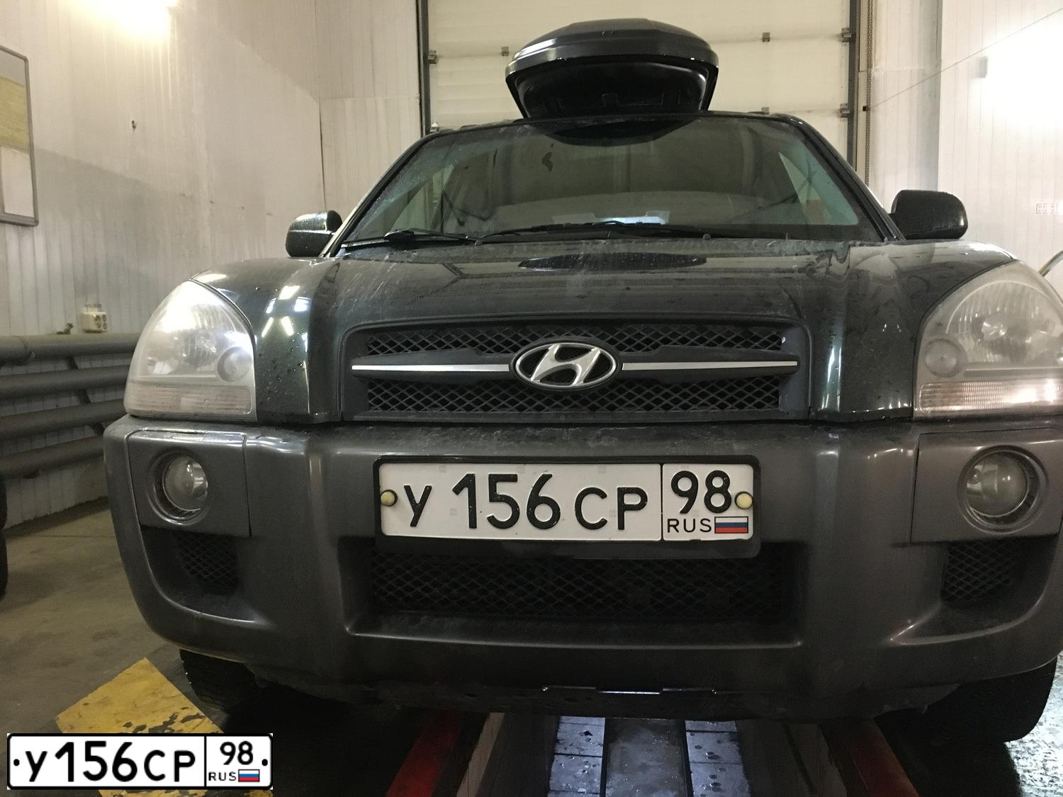 Фото автомобиля HYUNDAI TUCSON, 2006 — госномер У156СР98. Цвет: ТЕМНО-ЗЕЛЕНЫЙ