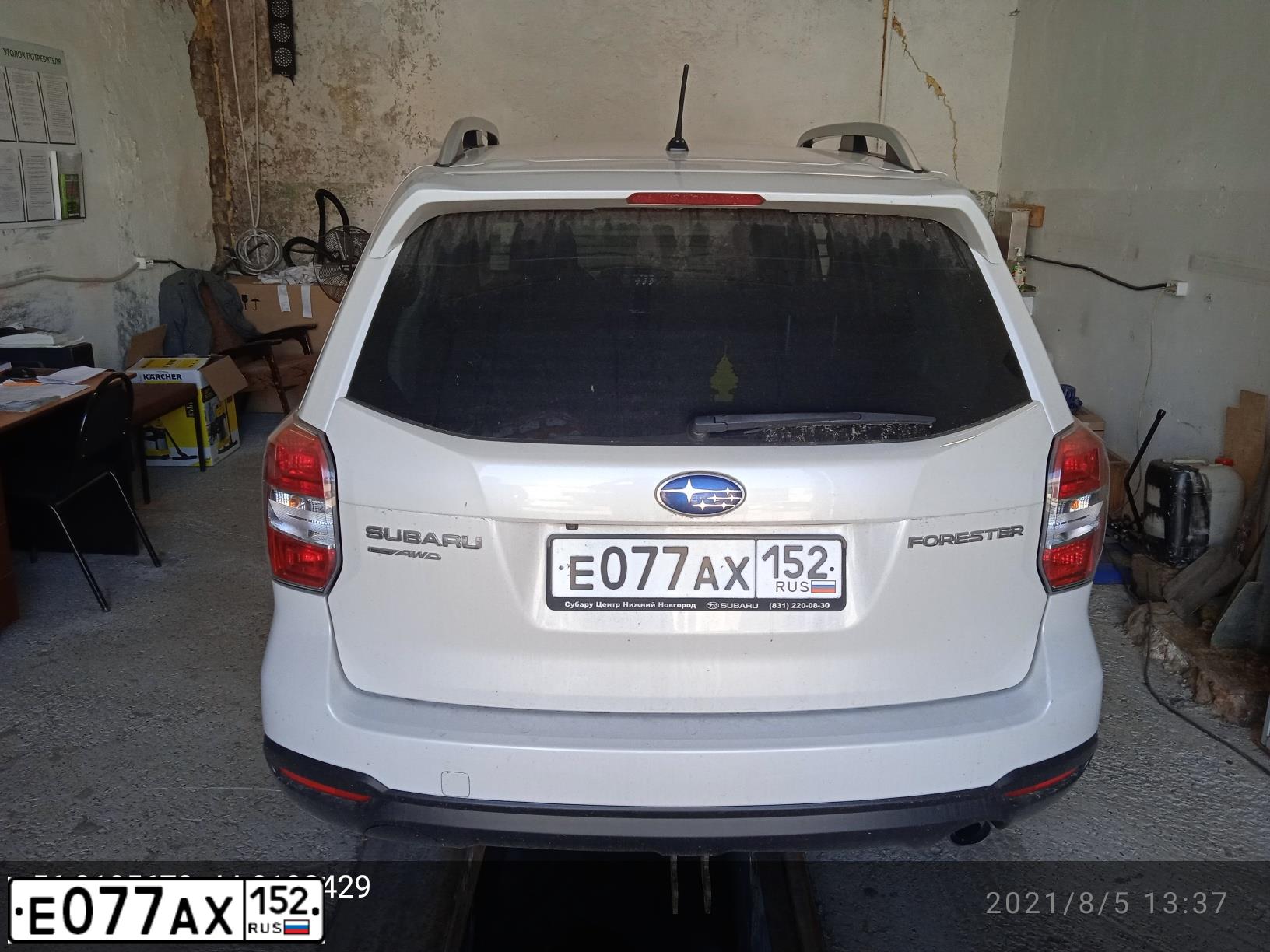 Фото автомобиля SUBARU FORESTER, 2014 — госномер Е077АХ152. Цвет: БЕЛЫЙ