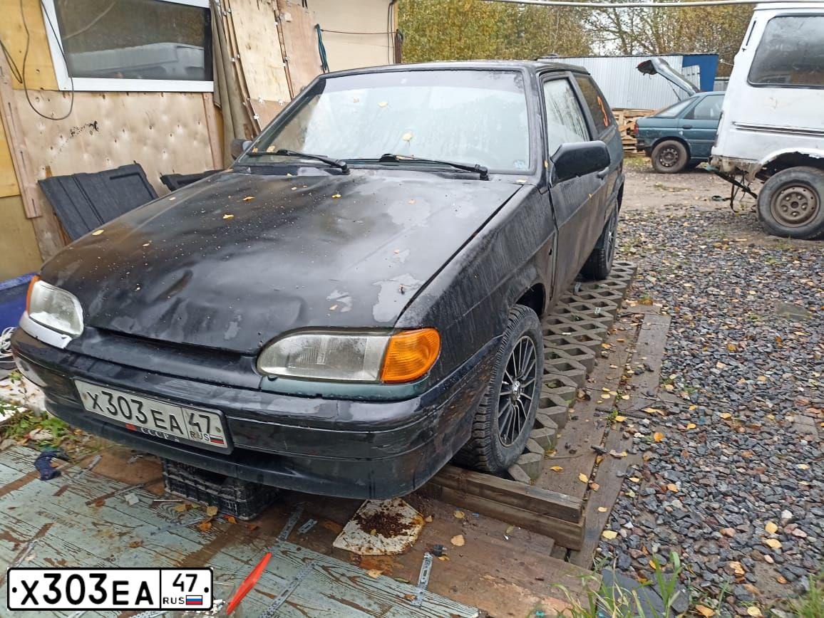 Фото автомобиля LADA 2113 SAMARA, 2012 — госномер Х303ЕА47. Цвет: СИНЕ-ЧЕРНЫЙ