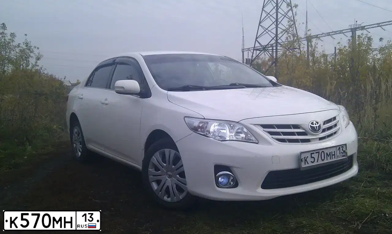 Фото автомобиля TOYOTA COROLLA, 2011 — госномер М598СО13. Цвет: Белый