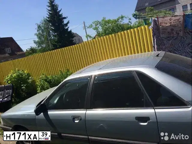 Фото автомобиля AUDI I 100, 1990 — госномер Р241ХЕ39. Цвет: ЗЕЛЕНЫЙ