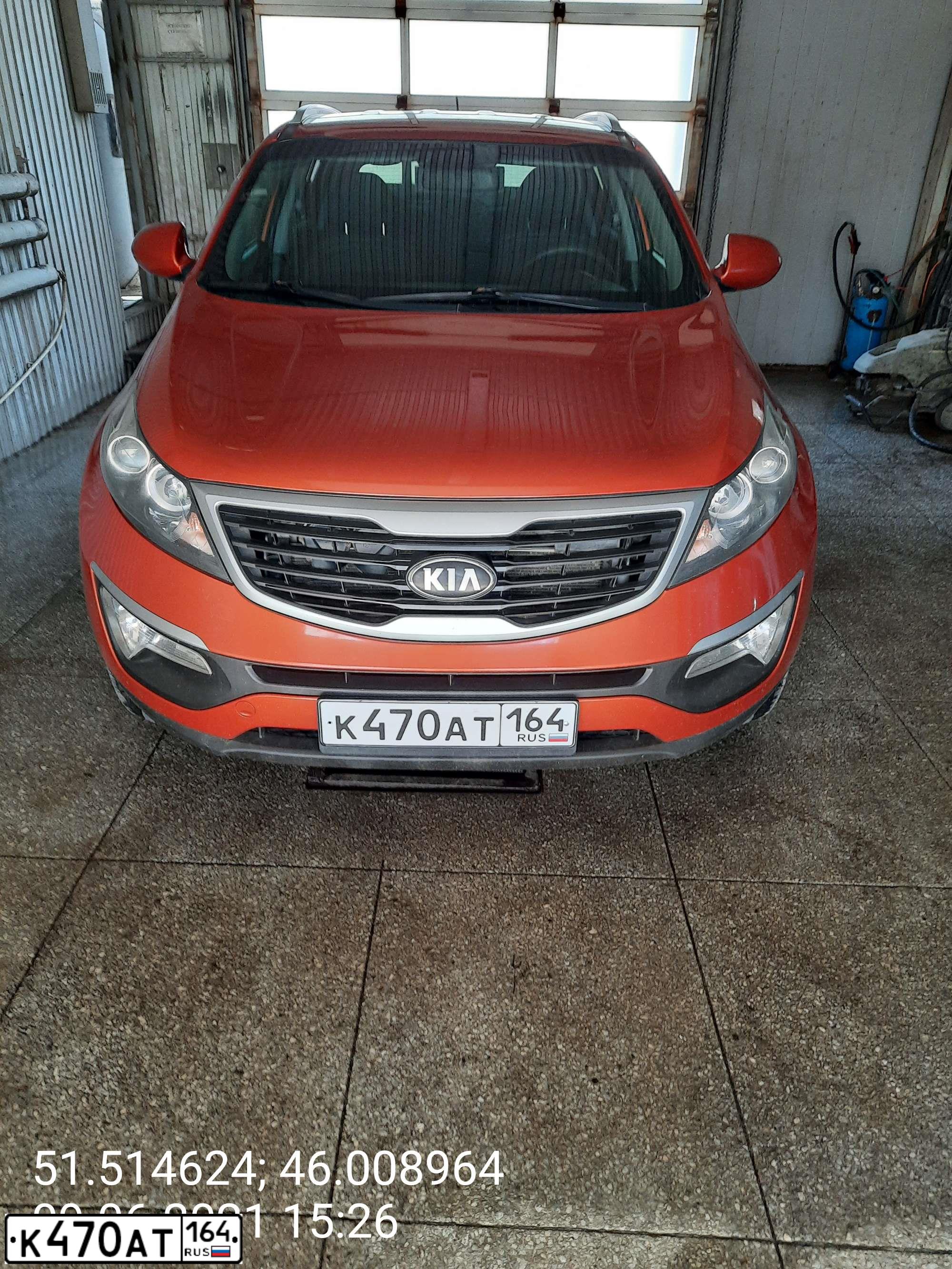 Фото автомобиля KIA SPORTAGE, 2013 — госномер К470АТ164. Цвет: Оранжевый
