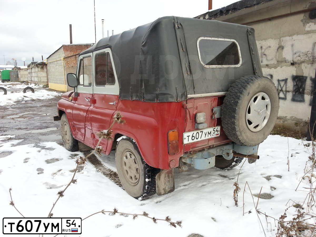 Фото автомобиля UAZ 3151 / HUNTER, 1994 — госномер Т607УМ54. Цвет: КРАСНЫЙ СЕРЫЙ