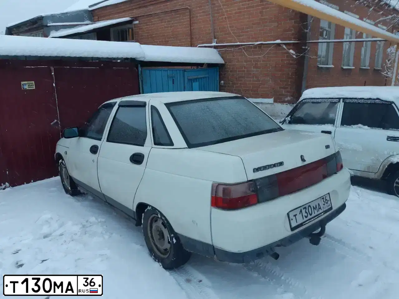 Фото автомобиля LADA 2110, 1997 — госномер Т130МА36. Цвет: БЕЛЫЙ