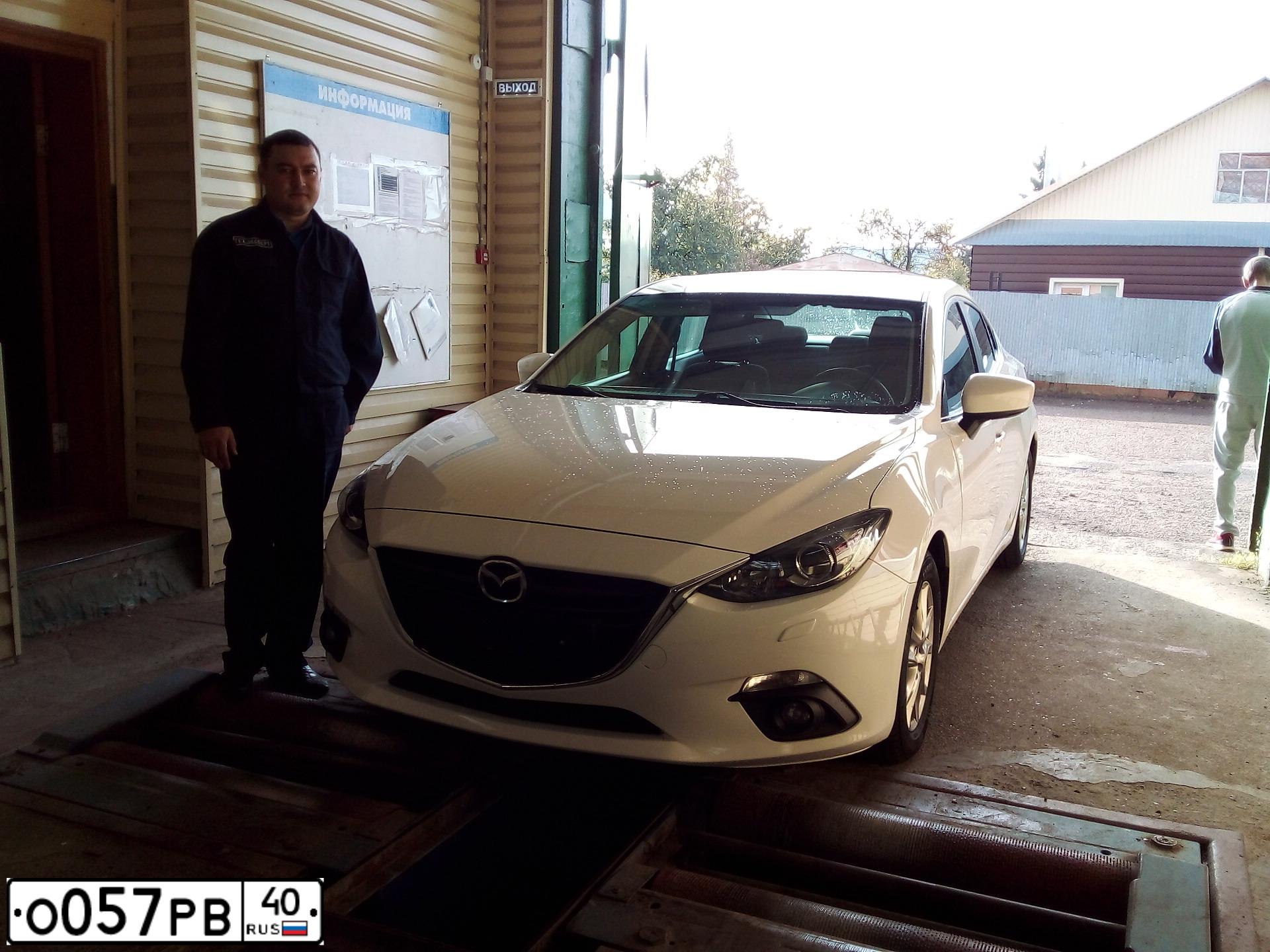 Фото автомобиля MAZDA 3, 2014 — госномер М677ТО13. Цвет: Белый
