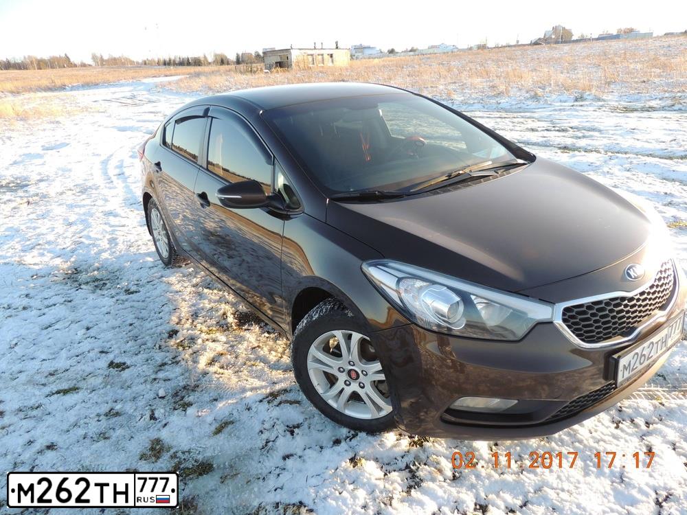 Фото автомобиля KIA CERATO, 2015 — госномер М262ТН777. Цвет: КОРИЧНЕВЫЙ