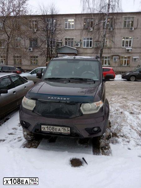 Фото автомобиля UAZ 3163 PATRIOT, 2015 — госномер А909ТХ43. Цвет: КОРИЧНЕВЫЙ МЕТАЛЛИК