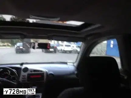 Фото автомобиля TOYOTA MATRIX, 2004 — госномер О197ЕС197. Цвет: Серый