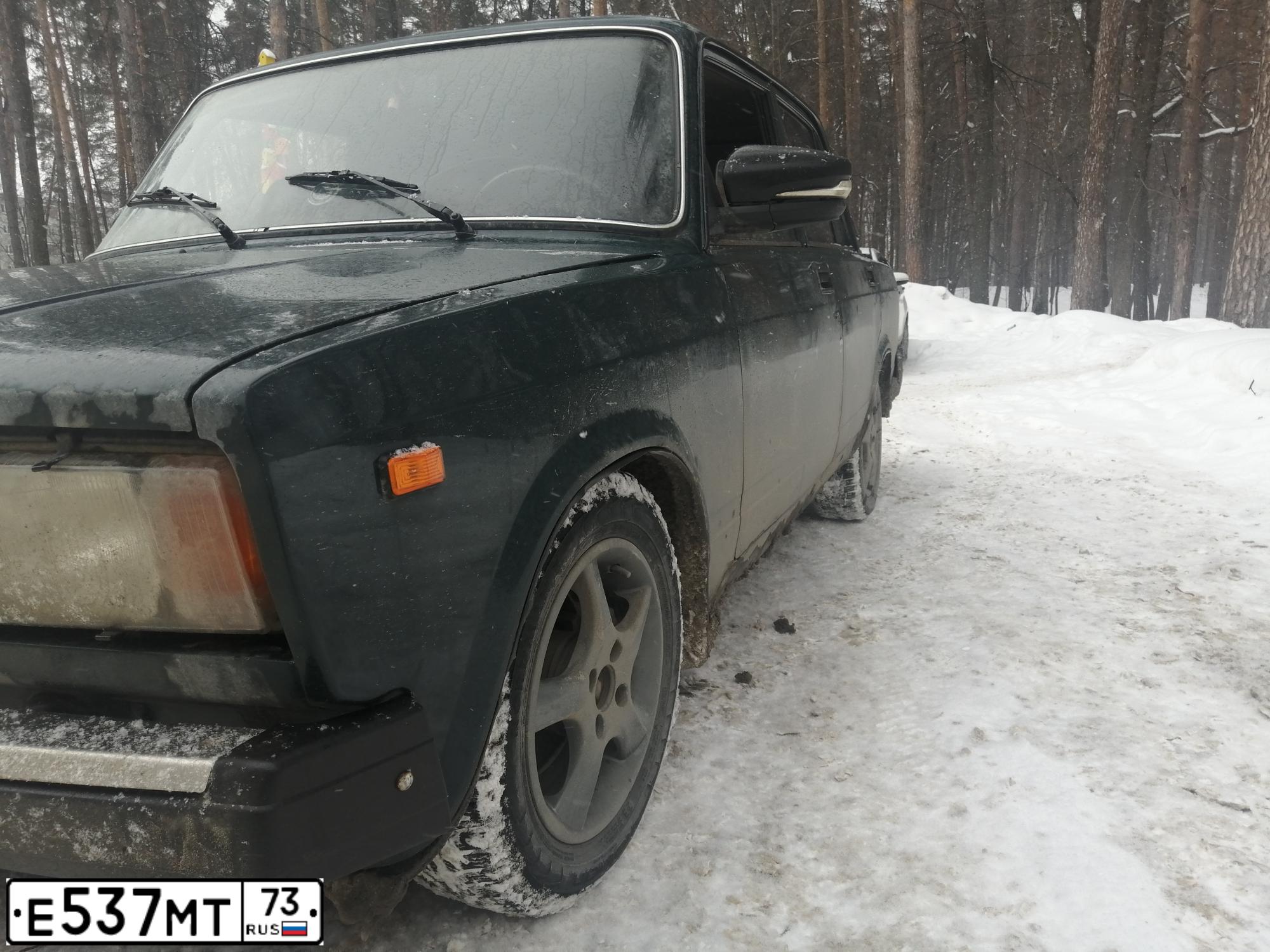 Фото автомобиля LADA 2190 GRANTA, 2015 — госномер Е537МТ73. Цвет: СЕРЫЙ СВЕТЛЫЙ