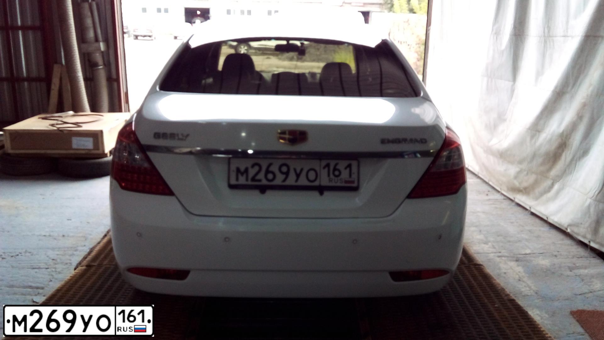 Фото автомобиля GEELY EMGRAND, 2014 — госномер М269УО161. Цвет: БЕЛЫЙ