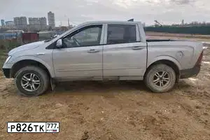 Фото автомобиля SSANGYONG ACTYON SPORTS, 2011 — госномер А765УС797. Цвет: СЕРЕБРИСТЫЙ