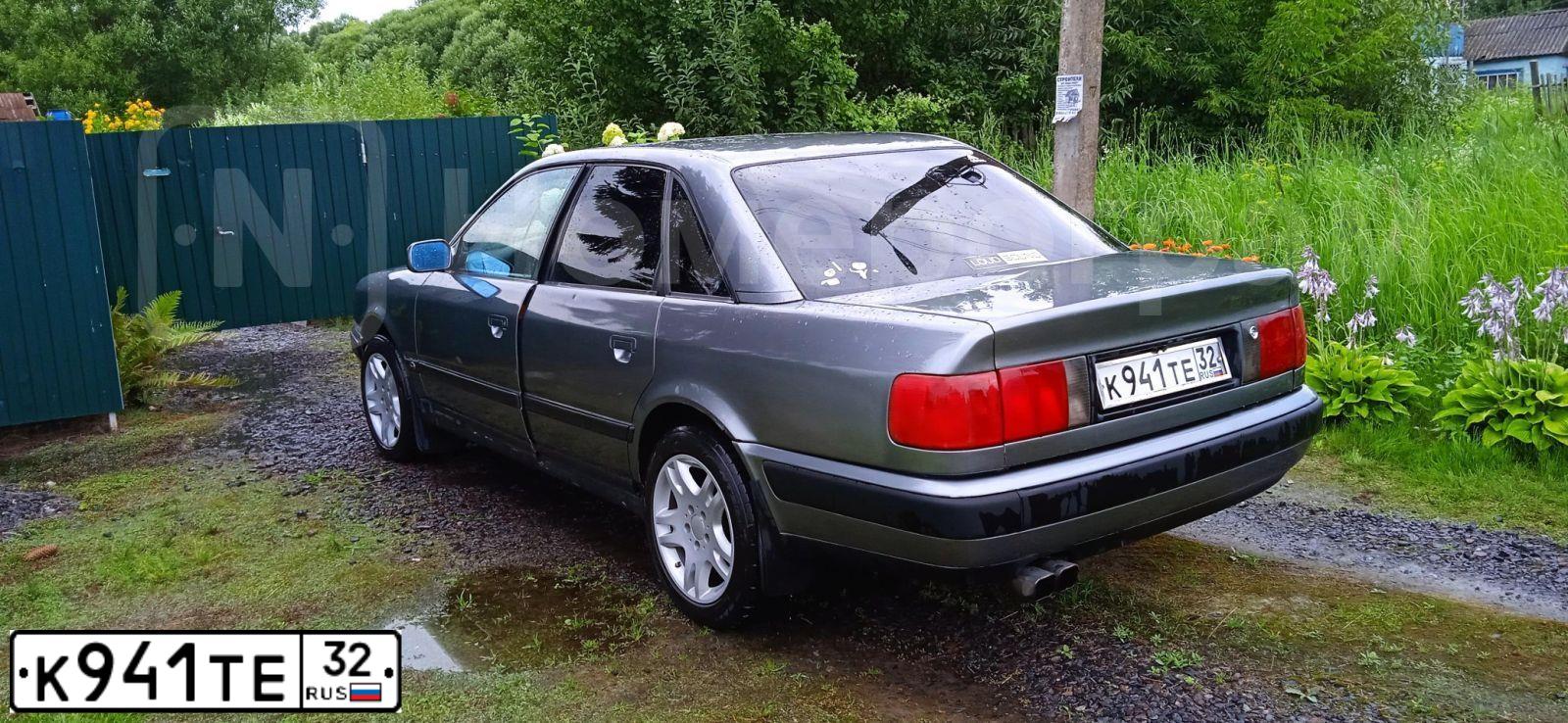 Фото автомобиля AUDI 100, 1992 — госномер К941ТЕ32. Цвет: СЕРЫЙ