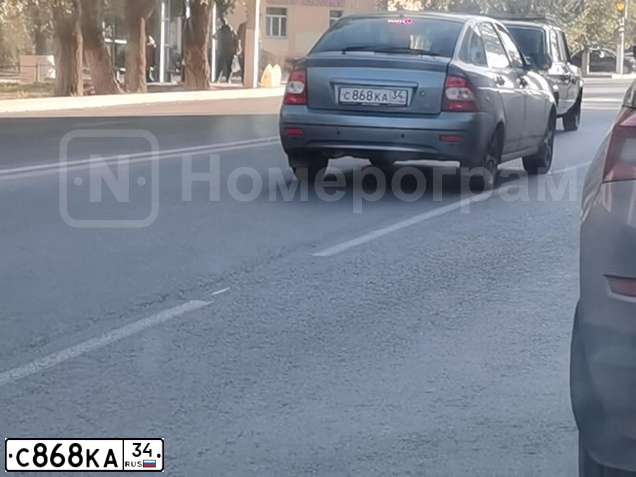 Фото автомобиля NISSAN TEANA, 2006 — госномер Х651МС30. Цвет: ЧЕРНЫЙ