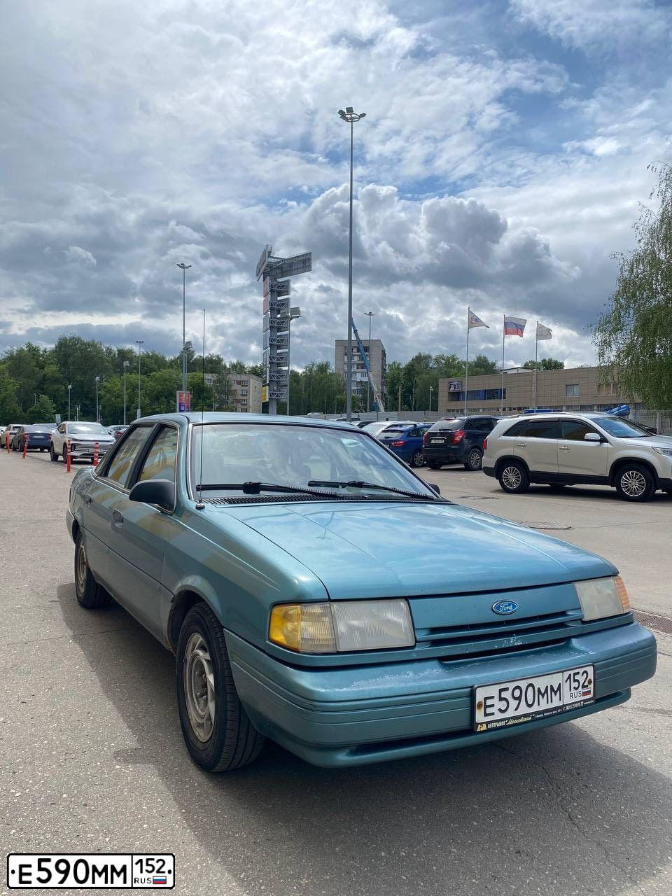 Фото автомобиля FORD TEMPO, 1993 — госномер Е590ММ152. Цвет: ЗЕЛЕНЫЙ