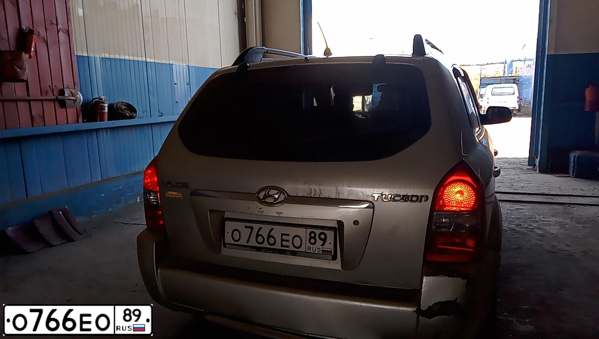 Фото автомобиля HYUNDAI TUCSON, 2006 — госномер О766ЕО89. Цвет: СВЕТЛО-СЕРЫЙ