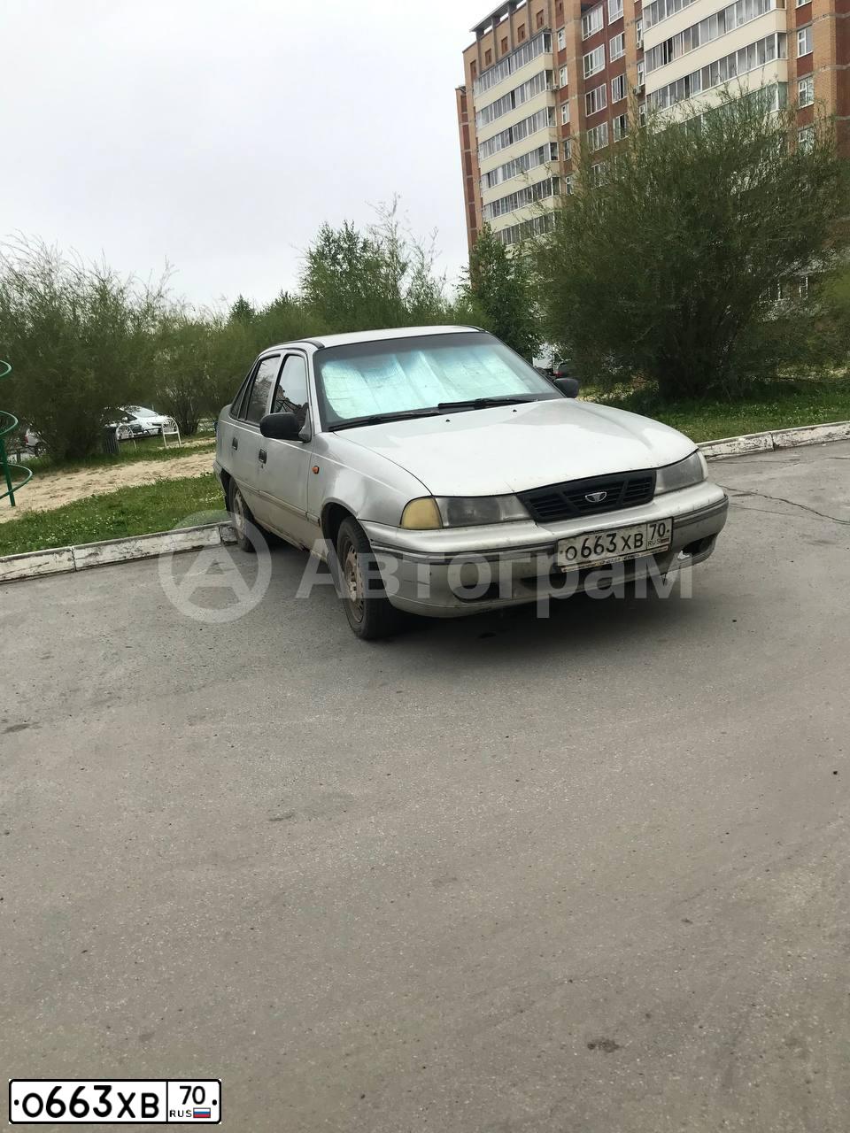Фото автомобиля DAEWOO NEXIA, 2004 — госномер О663ХВ70. Цвет: СЕРЕБРИСТЫЙ