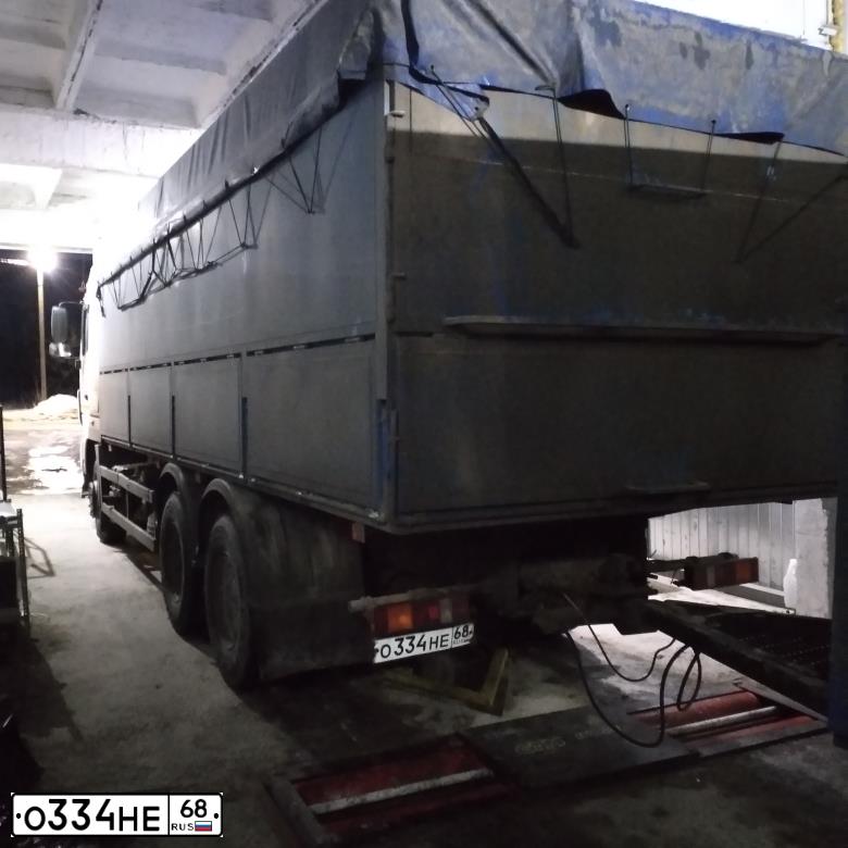 Фото автомобиля MAZ MAN MAZ-MAN 6312 /6X4/, 2013 — госномер О334НЕ68. Цвет: Белый
