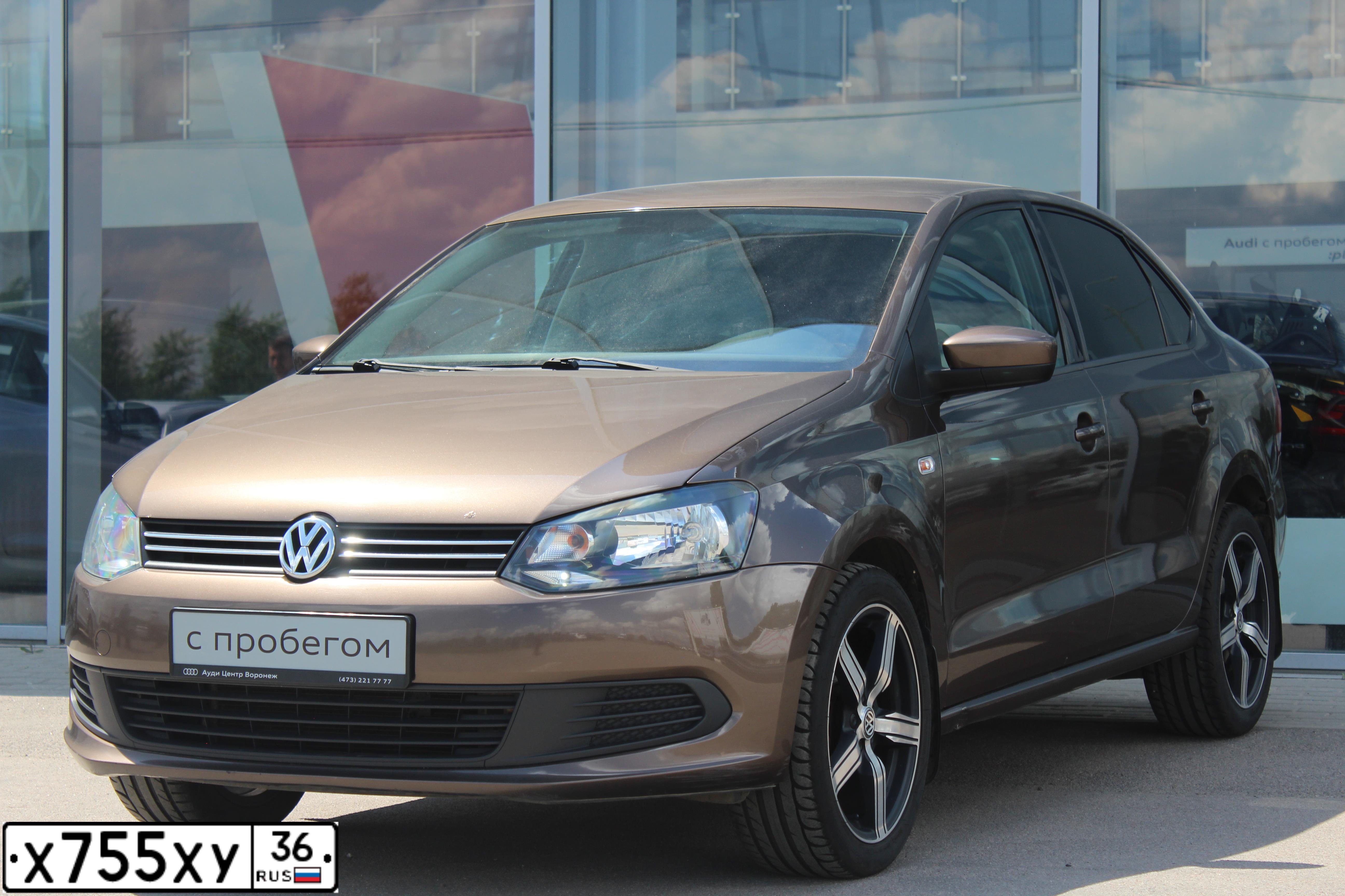 Фото автомобиля VOLKSWAGEN POLO, 2014 — госномер Т391НЕ136. Цвет: Коричневый