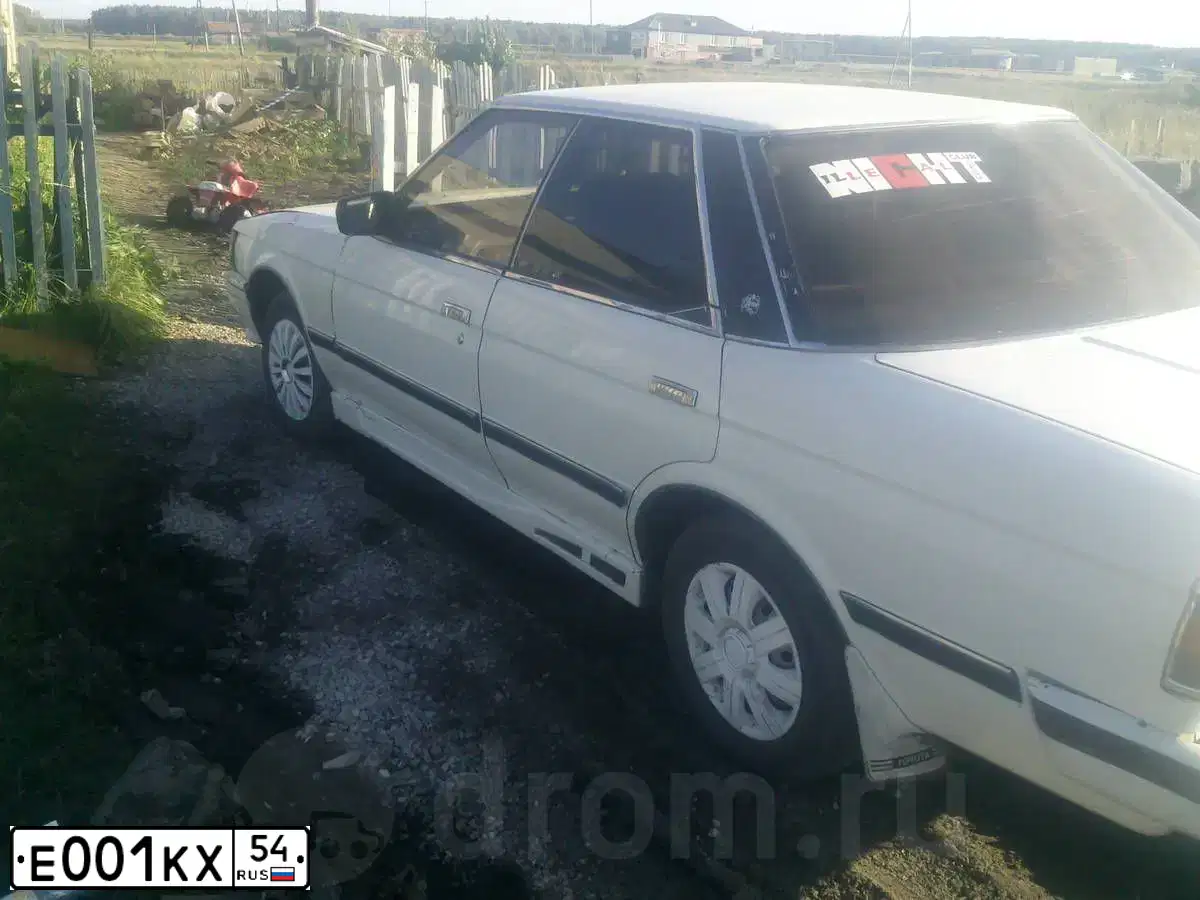 Фото автомобиля TOYOTA CAMRY, 2002 — госномер Е575СВ154. Цвет: ЧЕРНЫЙ