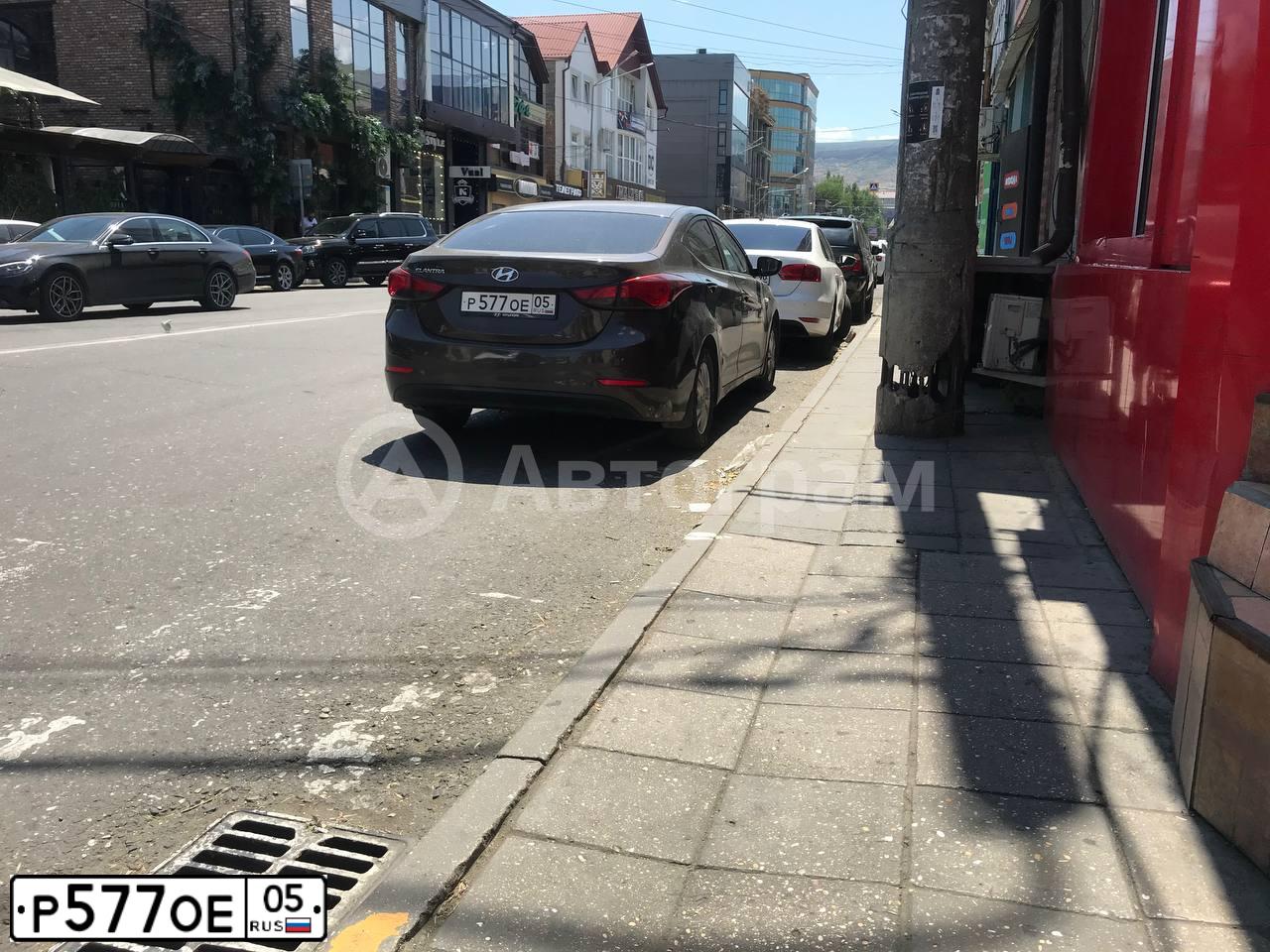 Фото автомобиля HYUNDAI ELANTRA, 2014 — госномер Н821ВА57. Цвет: Коричневый