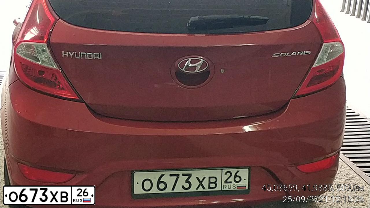Фото автомобиля HYUNDAI SOLARIS, 2012 — госномер О673ХВ26. Цвет: КРАСНЫЙ ГРАНАТ