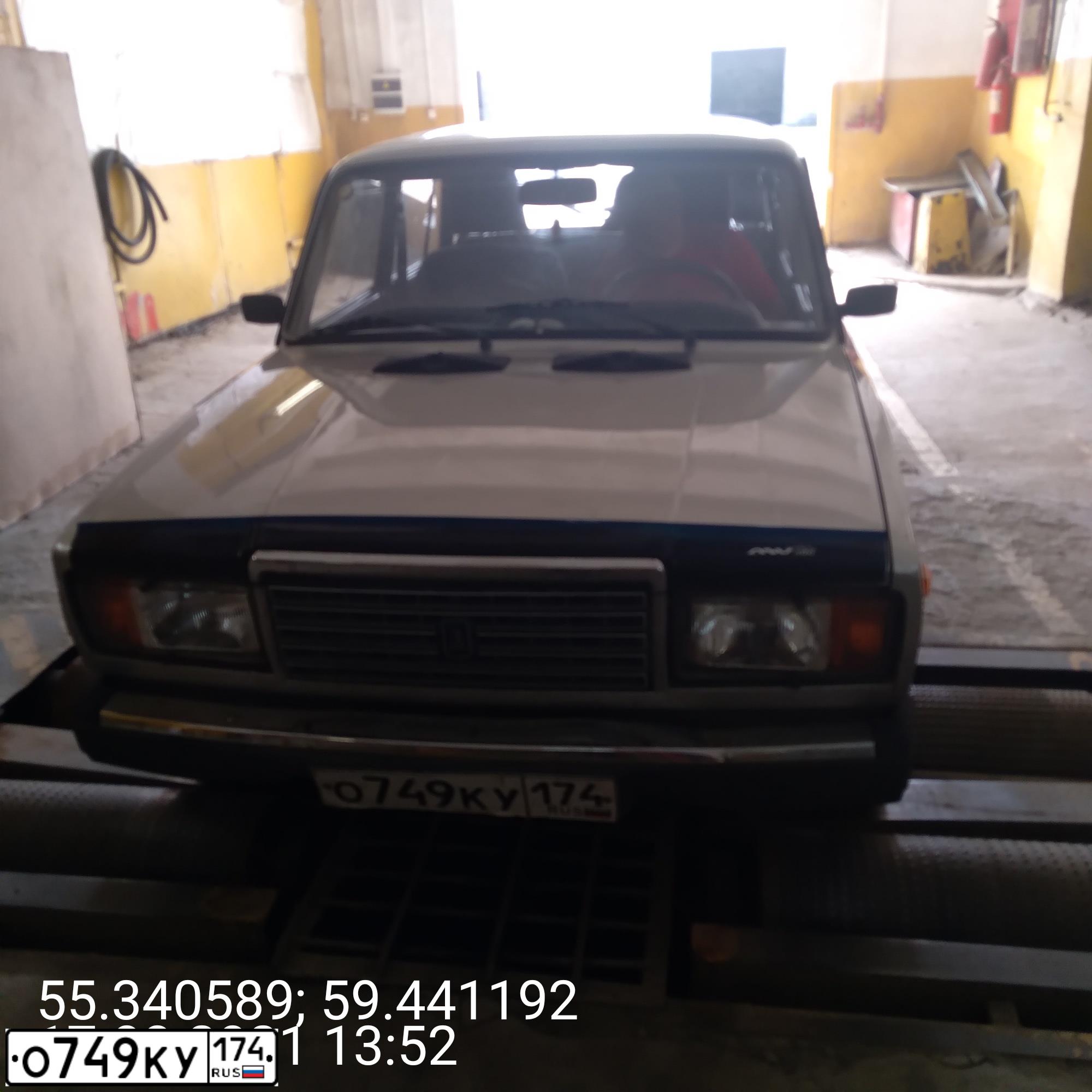 Фото автомобиля LADA 2104, 2009 — госномер О749КУ174. Цвет: СЕРЕБРИСТЫЙ